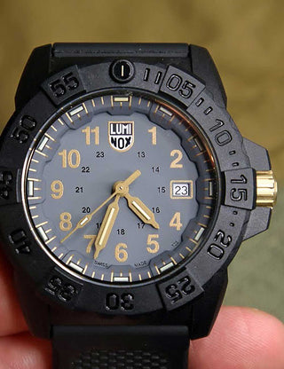 Angle shot of Luminox XS.3508.GOLD Grey Dial Black Strap Unisex Watch on white background