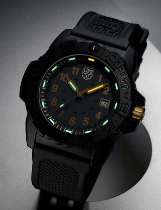Angle shot of Luminox XS.3508.GOLD Grey Dial Black Strap Unisex Watch on white background