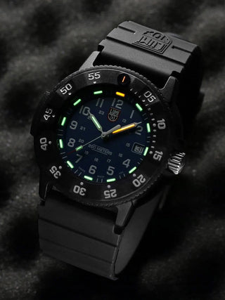 Angle shot of Luminox XS.3003.EVO.S Blue Dial Black Silicone Unisex Watch on white background